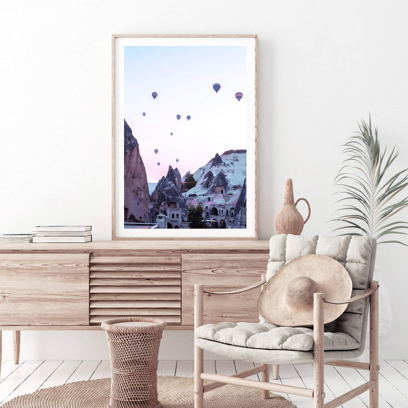 Balloons Over Cappadocia-The Paper Tree-architecture,balloons,cappodocia,city,destination,horizon,hot air balloons,mountains,pink,portrait,premium art print,purple,sunset,town,travel,turkey,villa,wall art,Wall_Art,Wall_Art_Prints